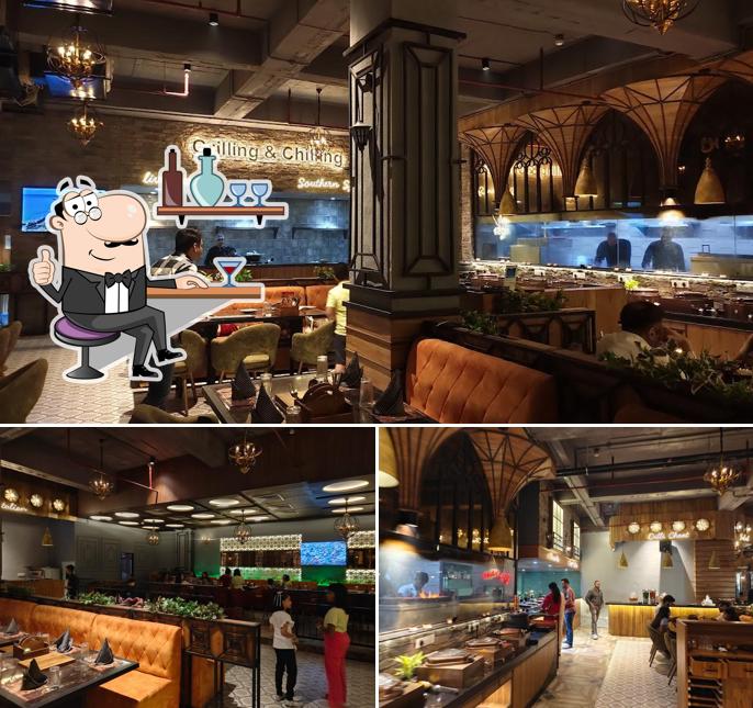 Take a seat at one of the tables at Castles Barbeque - Elan town center (Gurgaon) Take a seat at one of the tables at Castles Barbeque - Elan town center (Gurgaon)