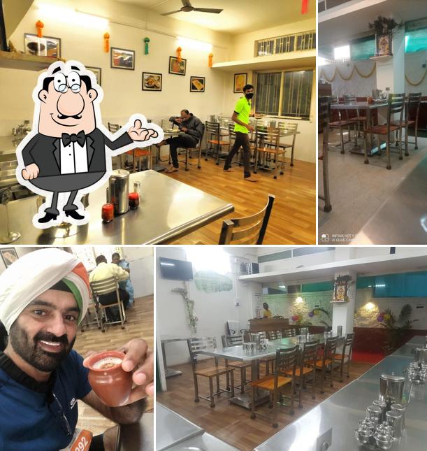 Take a seat at one of the tables at Vasant Bhojanalay Satara