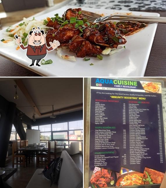 The photo of AQUA CUISINE Family Restaurant’s food and interior