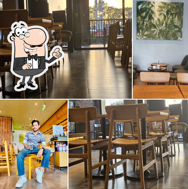 Take a seat at one of the tables at Starbucks