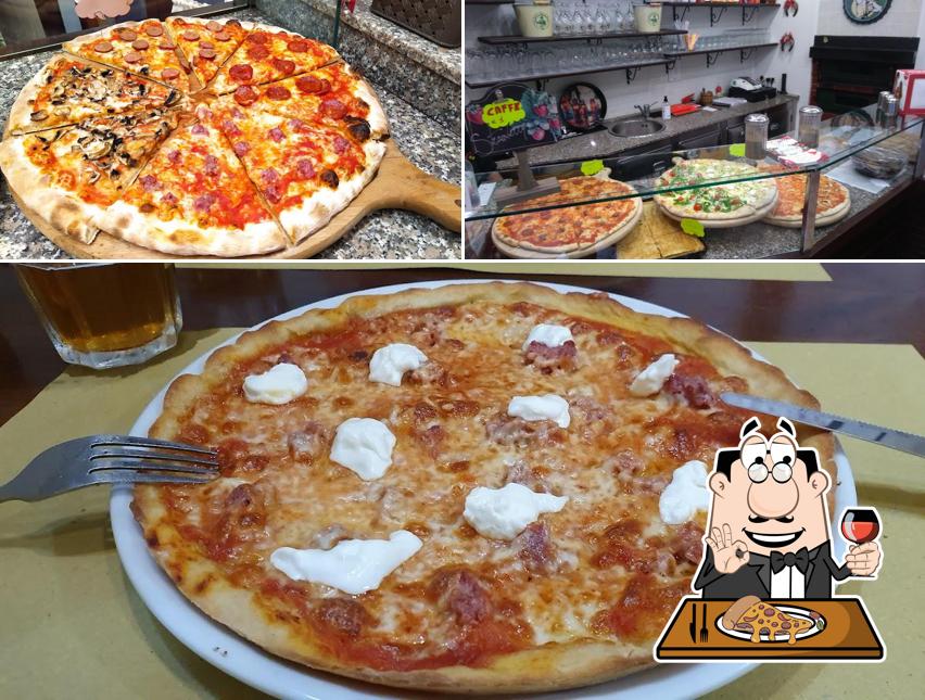 A Punto e a Capo, puoi prenderti una bella pizza