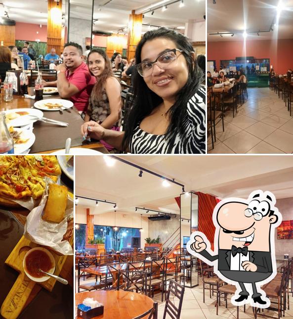 Sente em uma das mesas no Casa Veneza - Pizzaria e Massas Artesanais