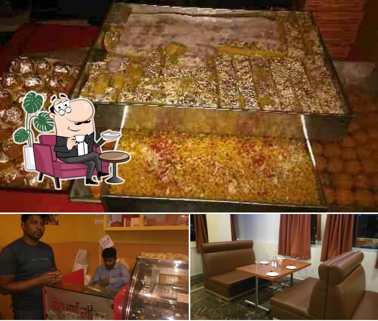 Among various things one can find interior and food at Mota Bhai Sweets