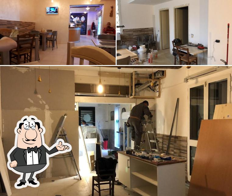 Dai un'occhiata agli interni di Pizzeria Gina