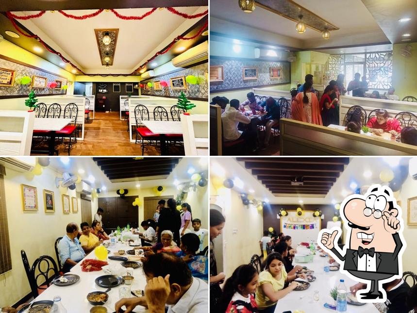 Take a seat at one of the tables at Waalai Aahar (Multi-cuisine Restaurant & Caterers)