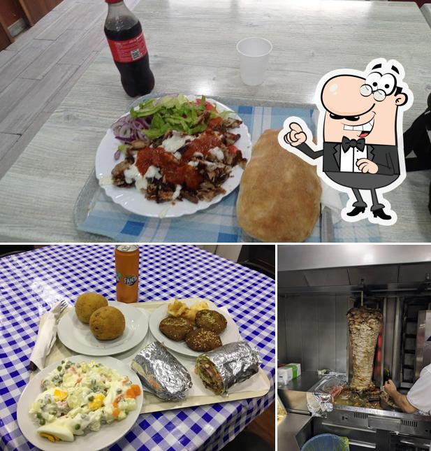 Questa è la foto che mostra la interni e cibo di Pizzeria Kebab Roma