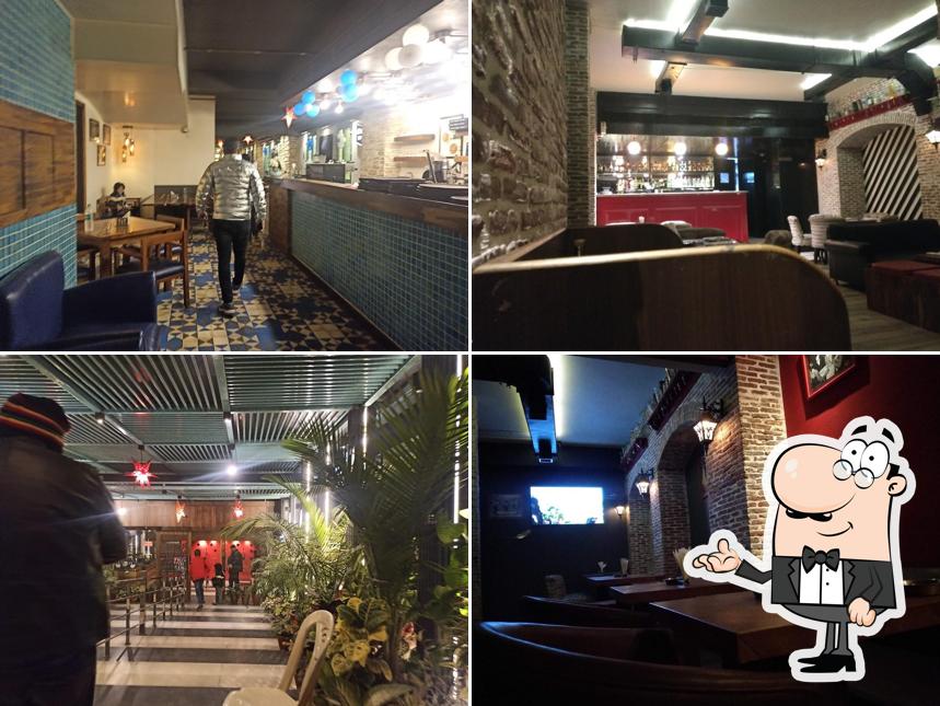 Take a seat at one of the tables at Outer Limit