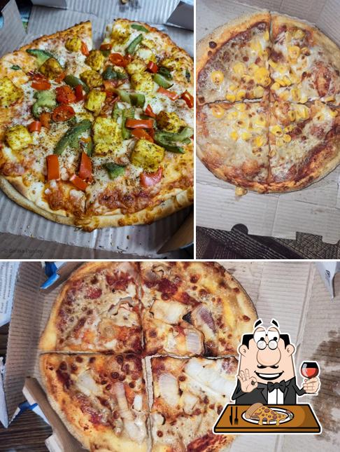 Try out pizza at Domino's Pizza Yamuna Vihar, New Delhi