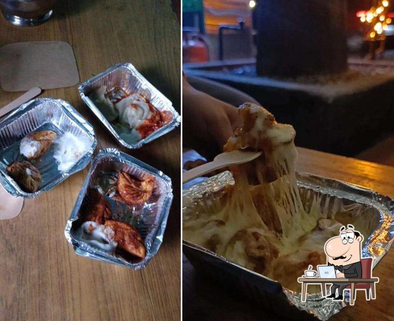 Take a seat at one of the tables at Little.dots Momos