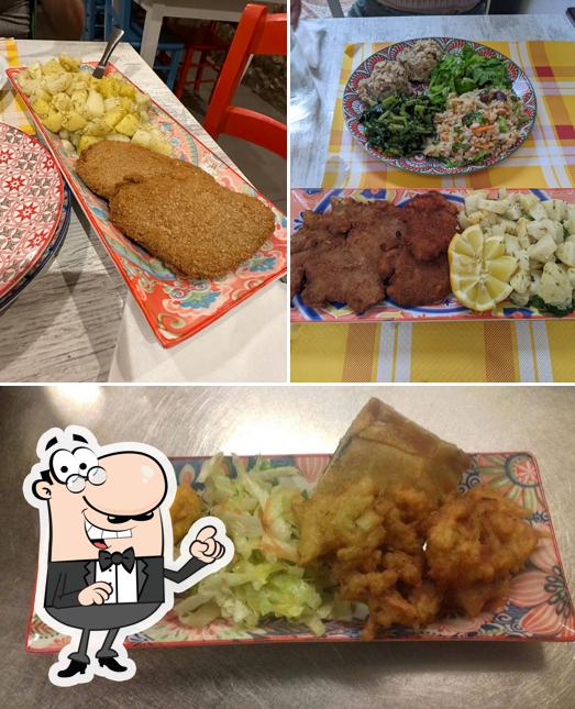 Guarda la foto che raffigura la interni e cibo di Ristorante Un Gelsomino