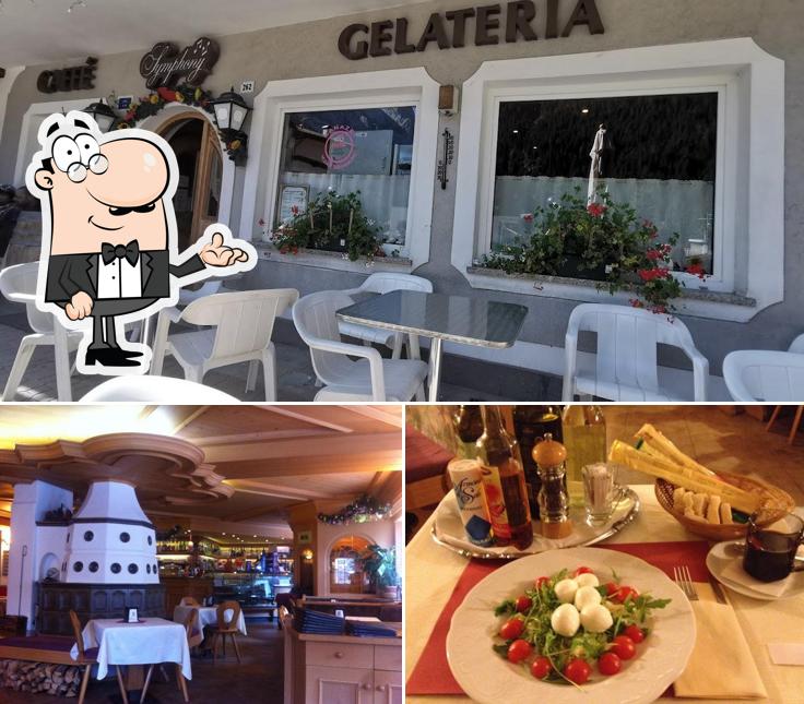 Dai un'occhiata agli interni di Caffè Symphony