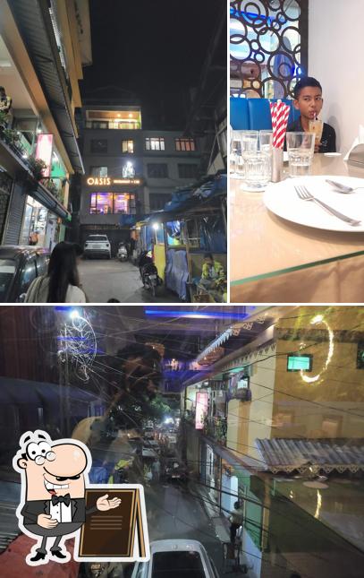 Among different things one can find exterior and interior at Oasis cafe