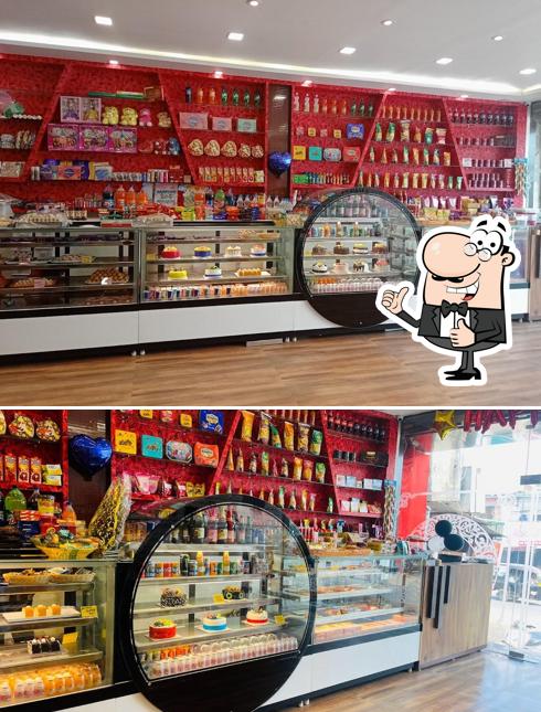 See this pic of Cake world cafe and sweets