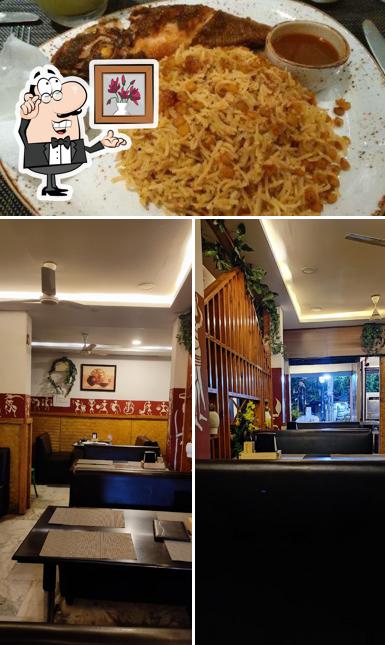 Among various things one can find interior and food at Sri Akshithaa Biryani mahal