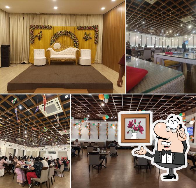 Take a seat at one of the tables at Hotel Aram, Jamnagar