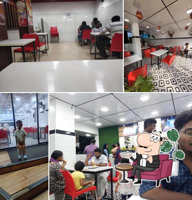 Take a seat at one of the tables at Bangalore Juicy Perumbavoor