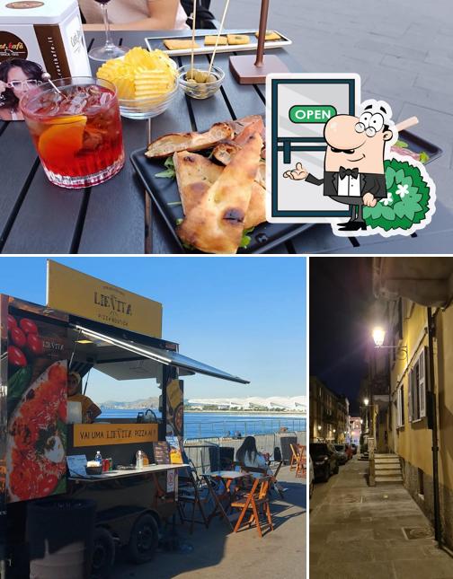 Questa è la immagine che mostra la esterno e cibo di Lièvita Food & Lounge
