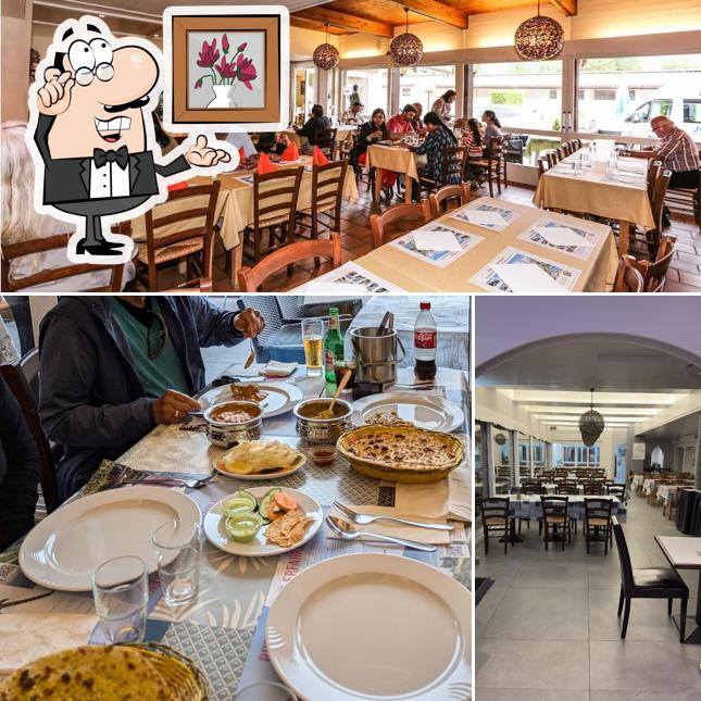Siediti a un tavolo di India Village Restaurant