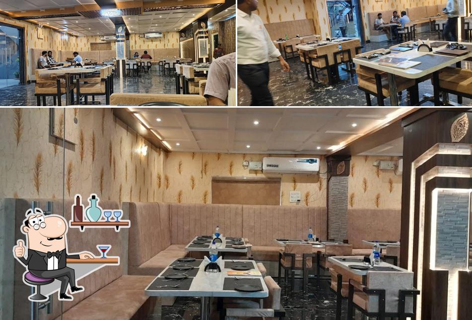 Take a seat at one of the tables at NEHA'S KITCHEN & BAKERY