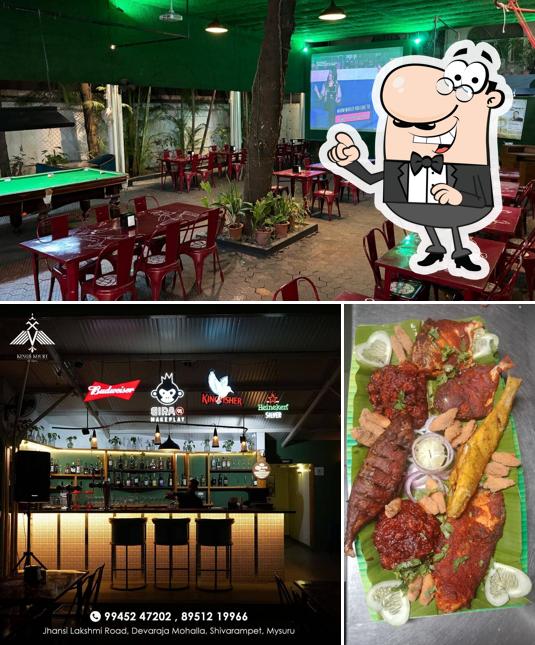 Take a seat at one of the tables at Kings Q Sports Bar