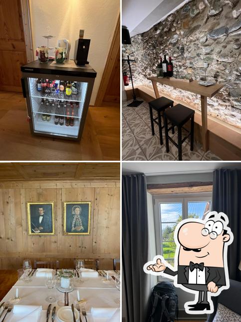 Siediti a un tavolo di Restaurant Bauernhof