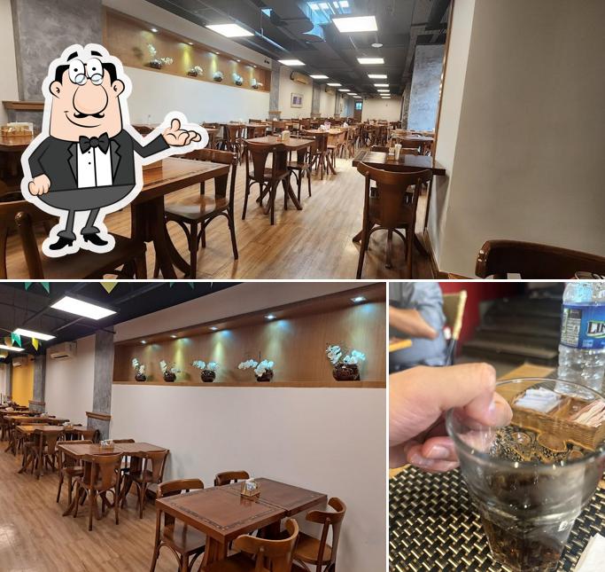 A imagem da interior e bebida no Restaurante Bombordo
