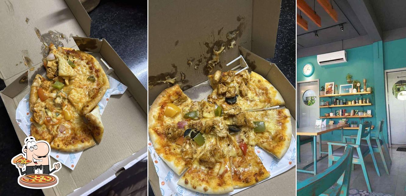 Get pizza at Cafe Addict