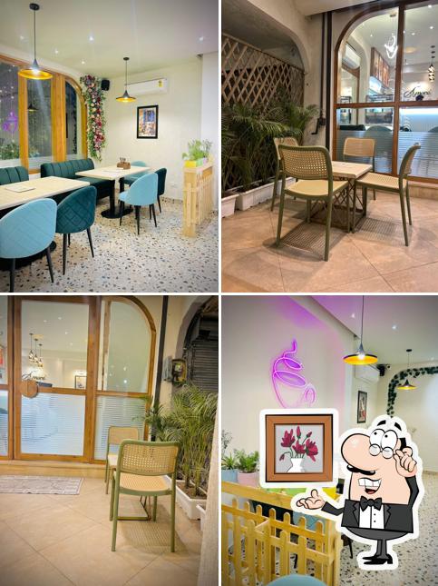 Take a seat at one of the tables at Cafe amoré