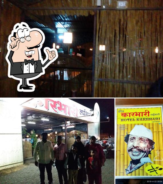 Take a seat at one of the tables at Hotel Karbhari lai bhari Veg & Non-veg