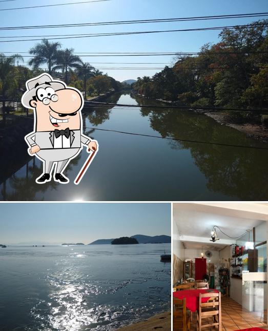 Dê uma olhada a imagem ilustrando exterior e interior a Restaurante Lá Em Casa