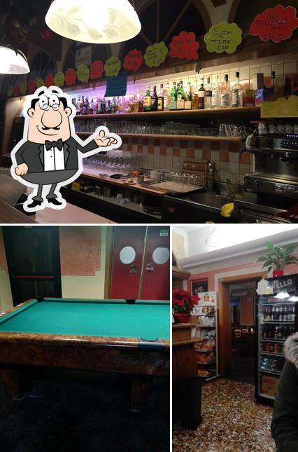 Dai un’occhiata alla foto che presenta la interni e bancone da bar di al galeone di Dai Lixia
