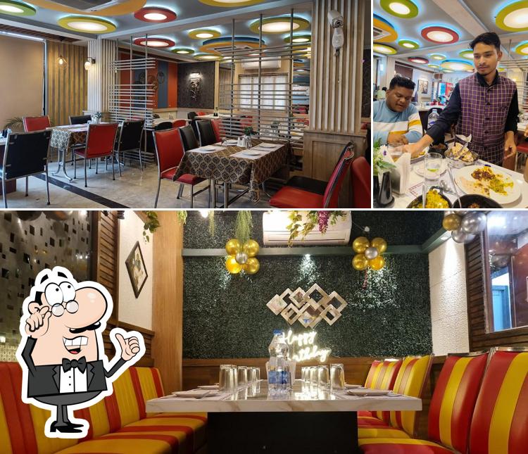 Take a seat at one of the tables at Urban Tadka Branch - 2