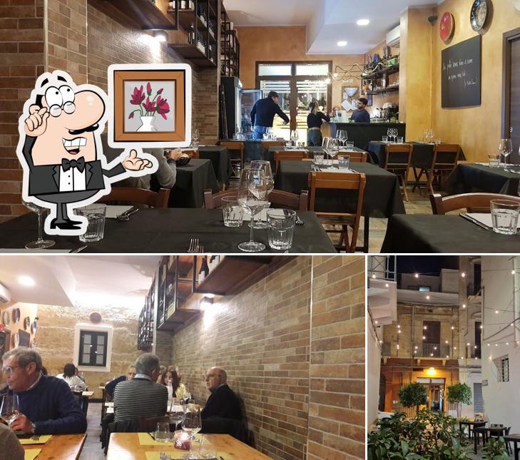 Dai un'occhiata agli interni di Taverna Quarant8