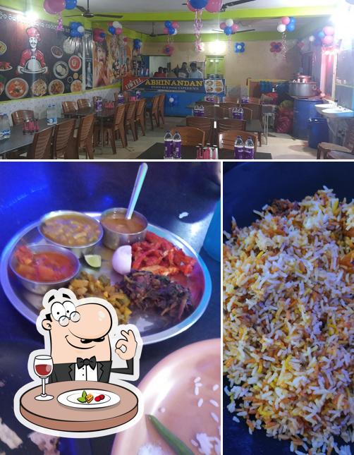 Take a look at the picture showing food and interior at Hotel Abhinandan