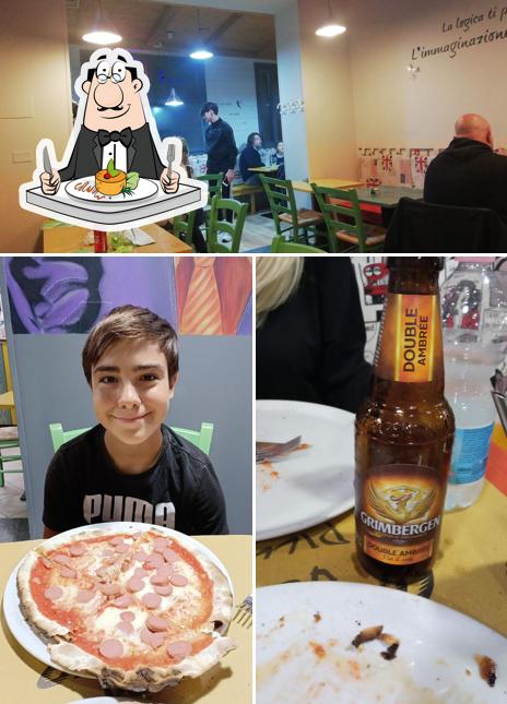 Questa è la immagine che mostra la cibo e interni di Pizza Grand prix