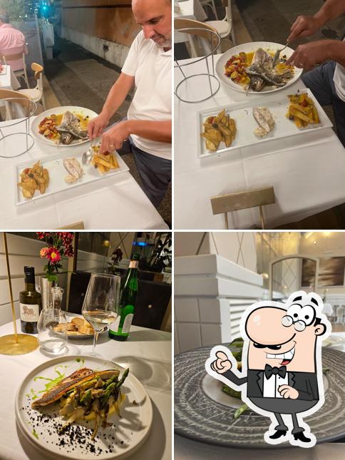 Dai un'occhiata agli interni di Crab Fish Restaurant