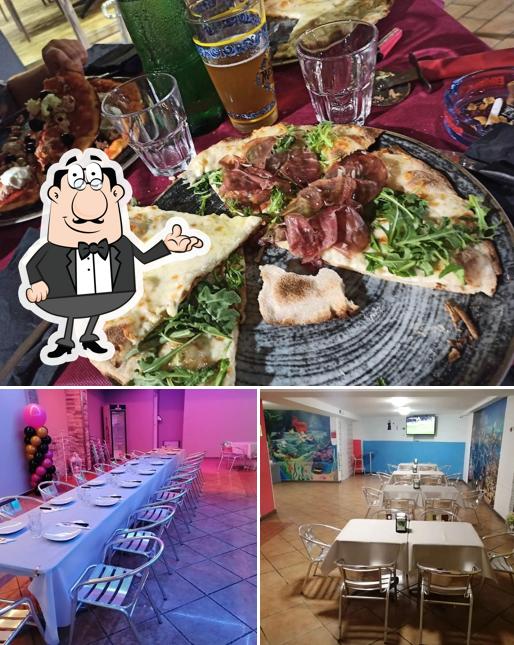 La immagine della interni e cibo di Pizzeria Lo Spicchio da Pino