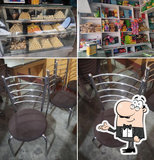 The image of interior and food at sriram sweet shop