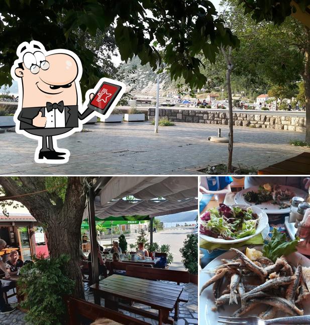 Puoi goderti l'aria fresca da seduto all'esterno di Konoba Portić