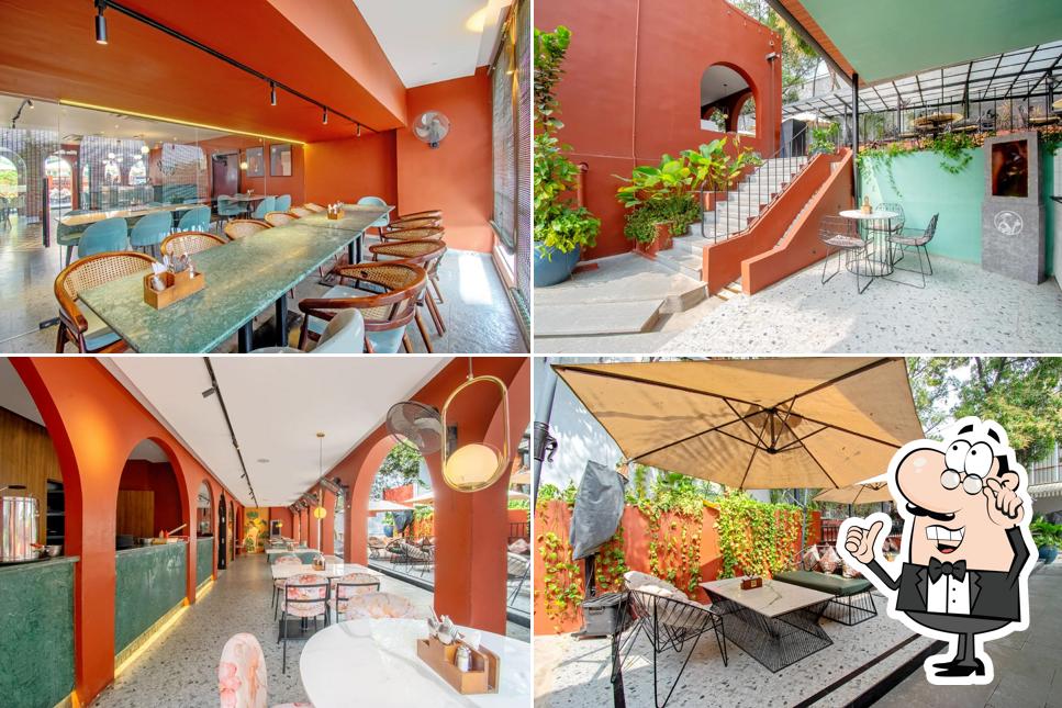 Take a seat at one of the tables at Nataka Global Kitchen And Cafe