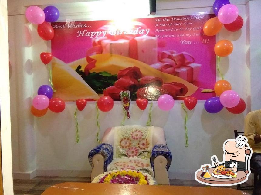 Get pizza at Dreams Cafe