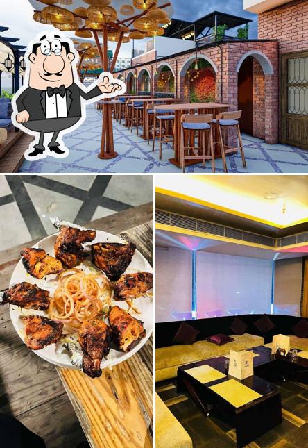 Take a seat at one of the tables at Infinity - Air Bar And Roof Dine