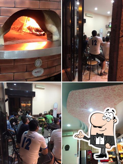 Siediti a un tavolo di Pizzeria La Roccia