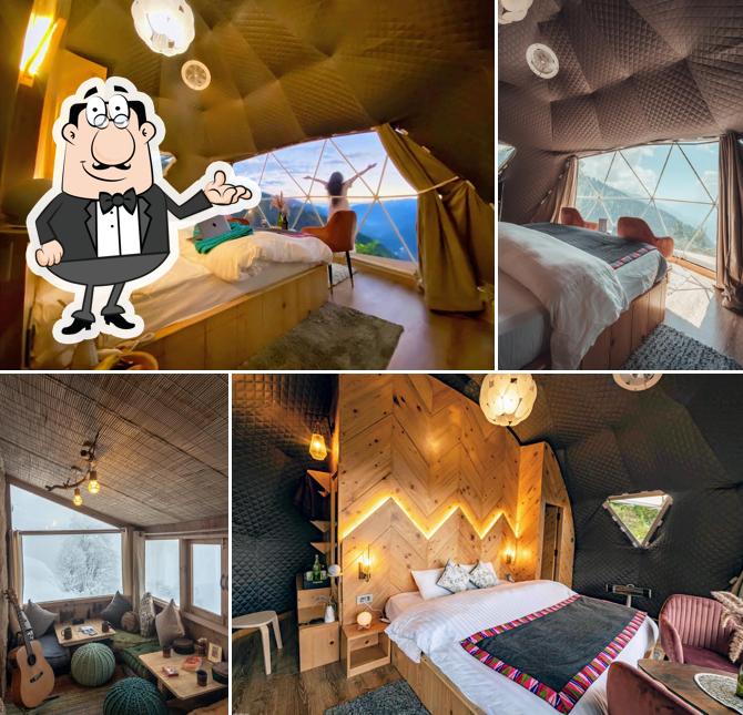 Take a seat at one of the tables at GlampEco Stays: India's First Unique Luxury Glamping Dome Stay in Sethan, Hamta Manali