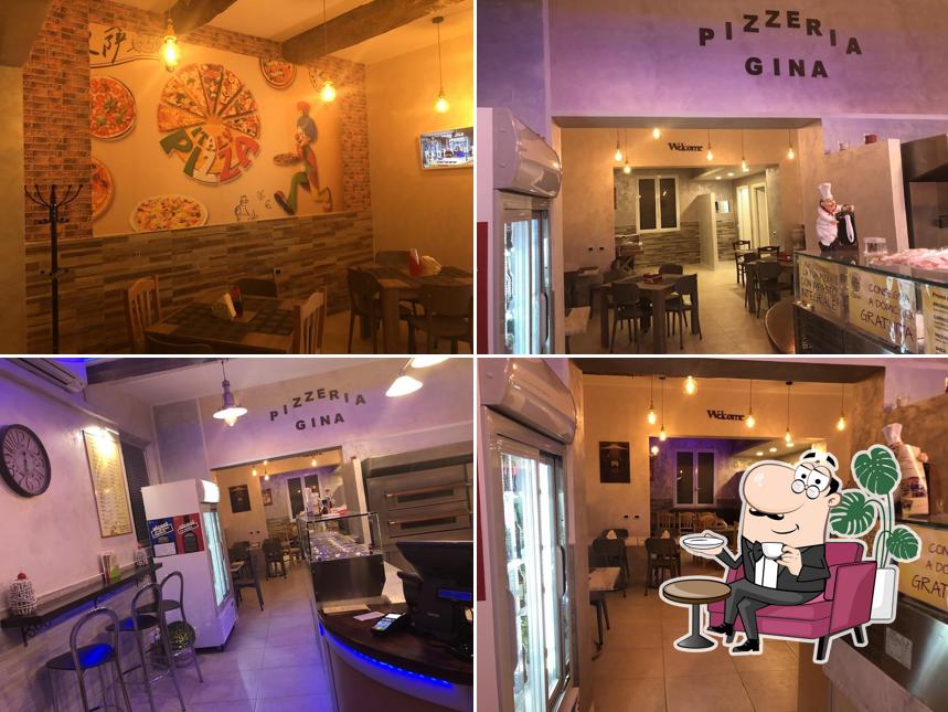 Siediti a un tavolo di Pizzeria Gina