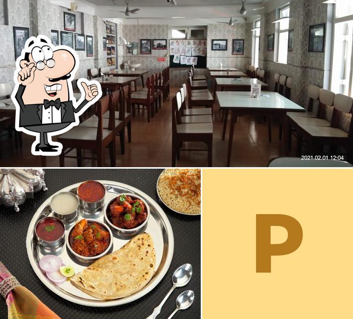 Take a seat at one of the tables at Padma Restaurant