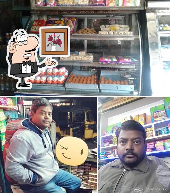 Check out the photo showing interior and food at Madhur Jalpan