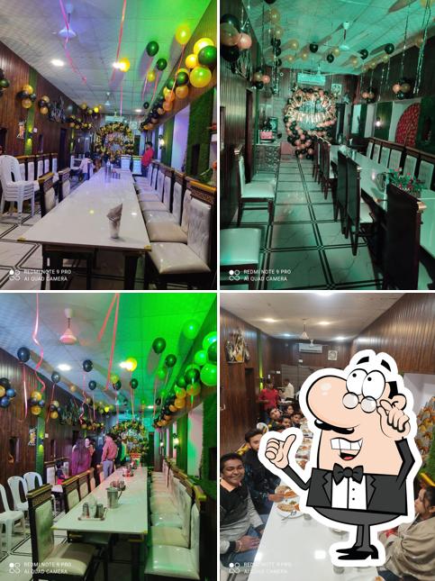 Take a seat at one of the tables at Shree Ram Cafe