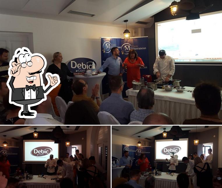 Dai un'occhiata agli interni di Moderato Coffee & Cakes