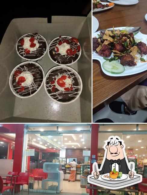 Take a look at the photo showing food and interior at Majestic Bakes and Bistro